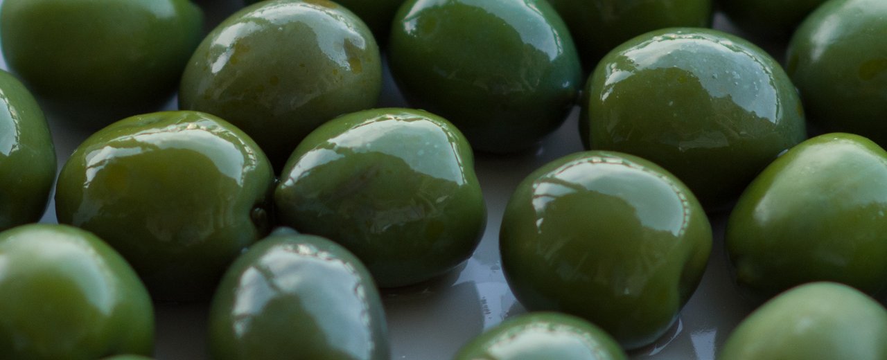 Bright green Castelvetrano (Nocellara del Belice) olives close up